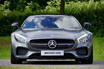 Front view of silver Mercedes-AMG GT sports car on road