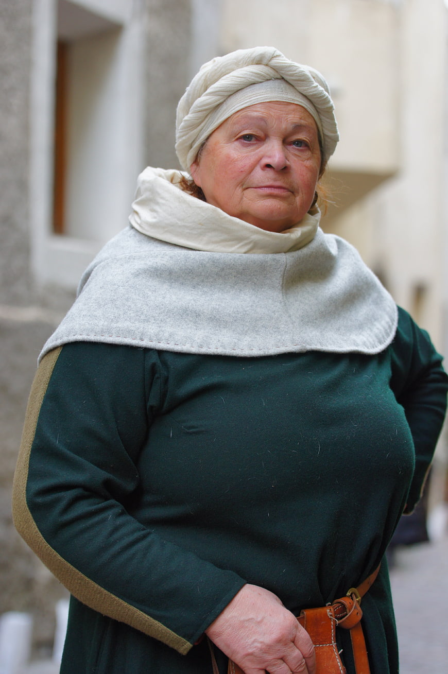 Portrait of elderly woman in medieval costume