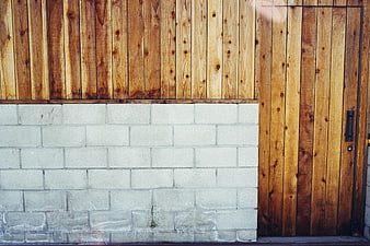 Modern wooden door and concrete block wall texture