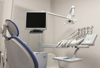 Modern Dental Treatment Chair And Equipment In Clinic