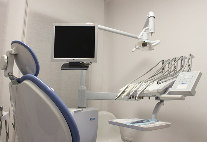 Modern Dental Treatment Chair And Equipment In Clinic