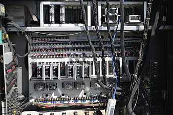 Close-up of industrial electrical control panel with wiring
