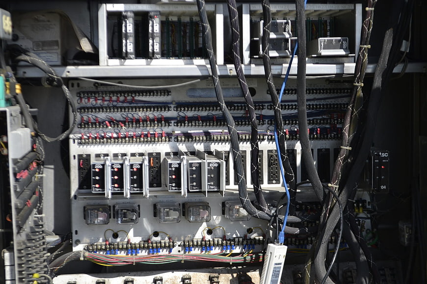 Close-up of industrial electrical control panel with wiring