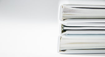 Minimalist Stack of White Books on White Background