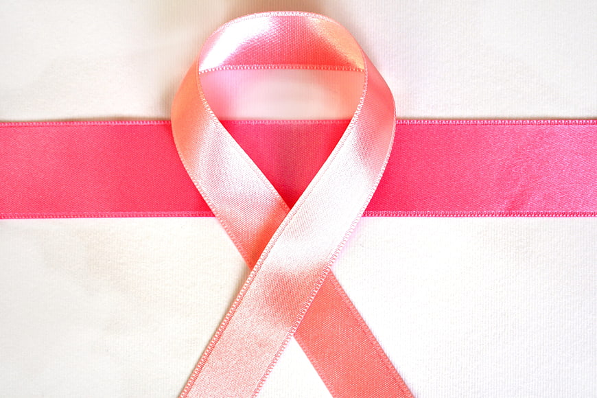 Pink Awareness Ribbon On White Background