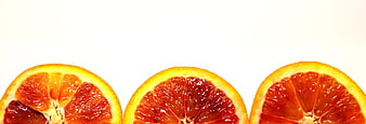 Sliced Blood Oranges on White Background