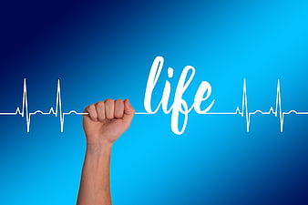 Hand holding white thread with life text and heartbeat line on blue background