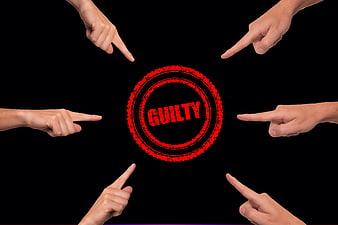 Six Hands Pointing At Red Guilty Stamp On Black Background