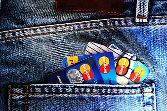 Mastercard credit cards in blue denim jeans pocket