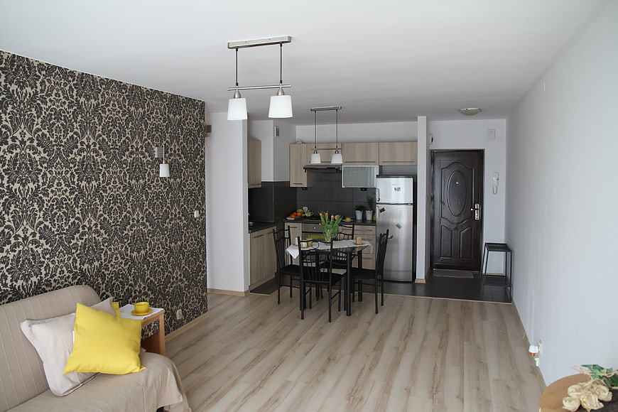 Modern Open-Plan Apartment Interior With Kitchenette And Living Area