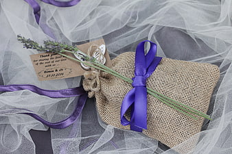 Rustic wedding favor bag with lavender and purple ribbon