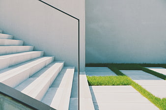 Minimalist Concrete Staircase with Green Grass
