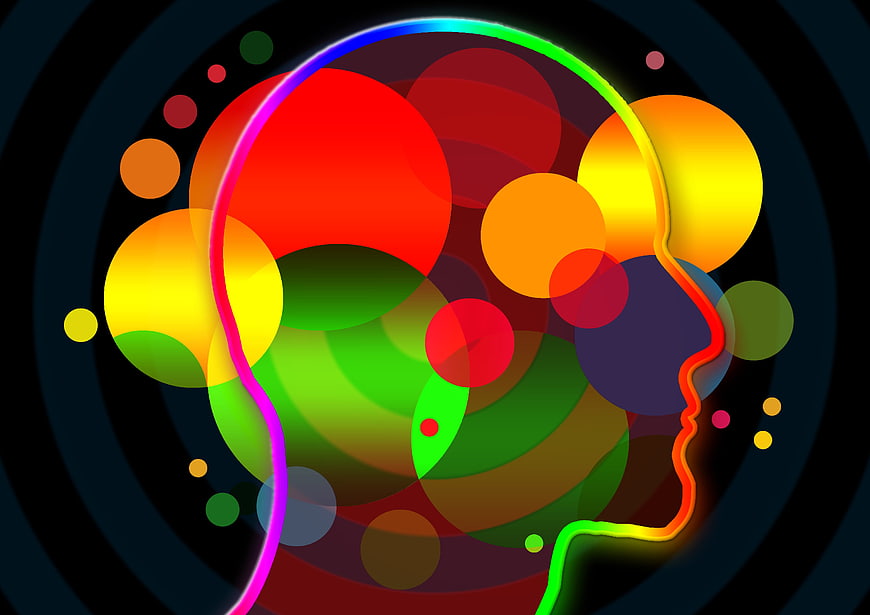 Abstract colorful human head silhouette with glowing circles