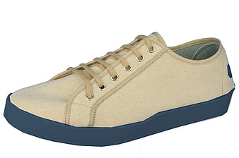 Beige Canvas Sneaker with Blue Sole on White Background