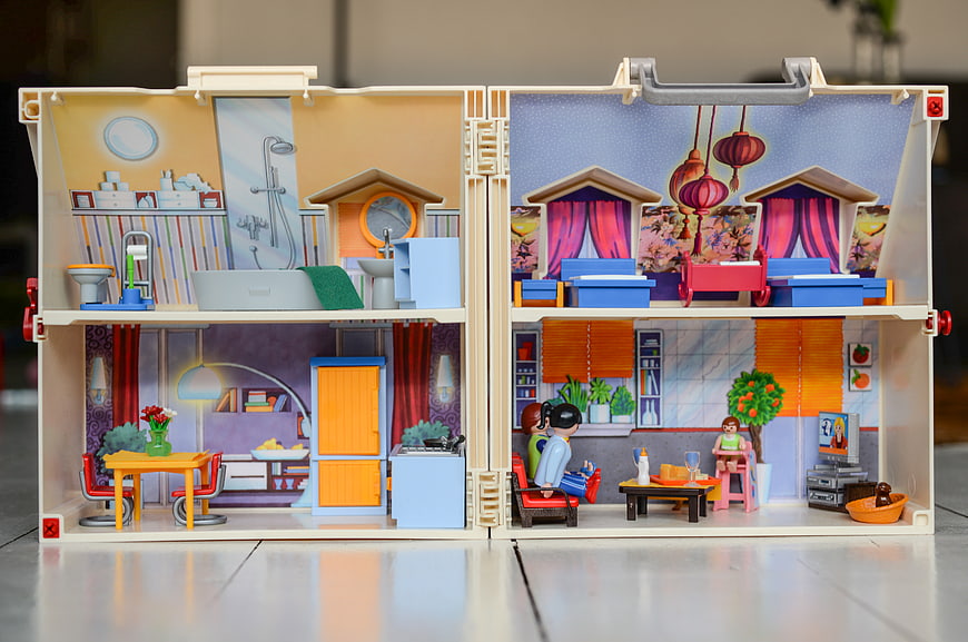 Colorful Playmobil Dollhouse with Detailed Interior Rooms and Figures