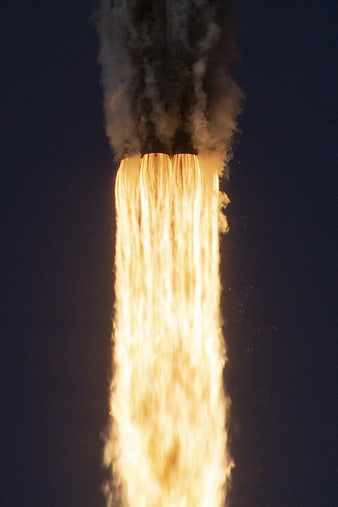 Rocket Engine Exhaust Flame and Smoke Plume at Night