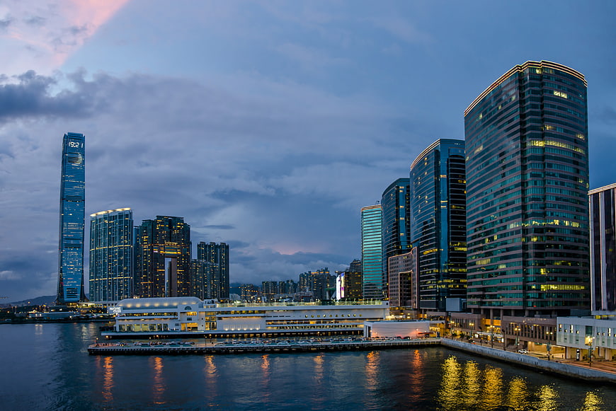 Hong Kong Skyline at Dusk with Skyscrapers and Water Reflections