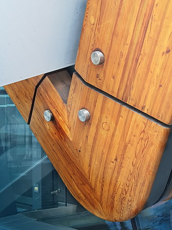 Modern Wooden Architectural Detail with Metal Bolts
