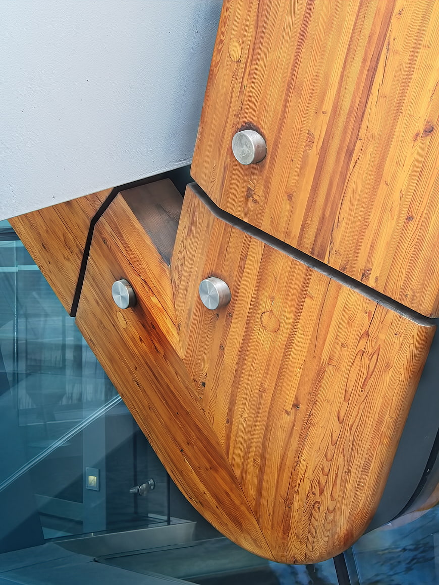 Modern Wooden Architectural Detail with Metal Bolts