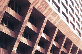 Modern geometric building facade with diagonal architectural pattern