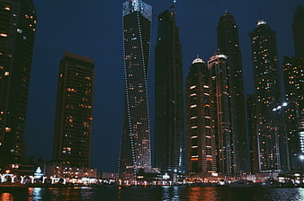 Night Skyline of Modern Skyscrapers and Marina