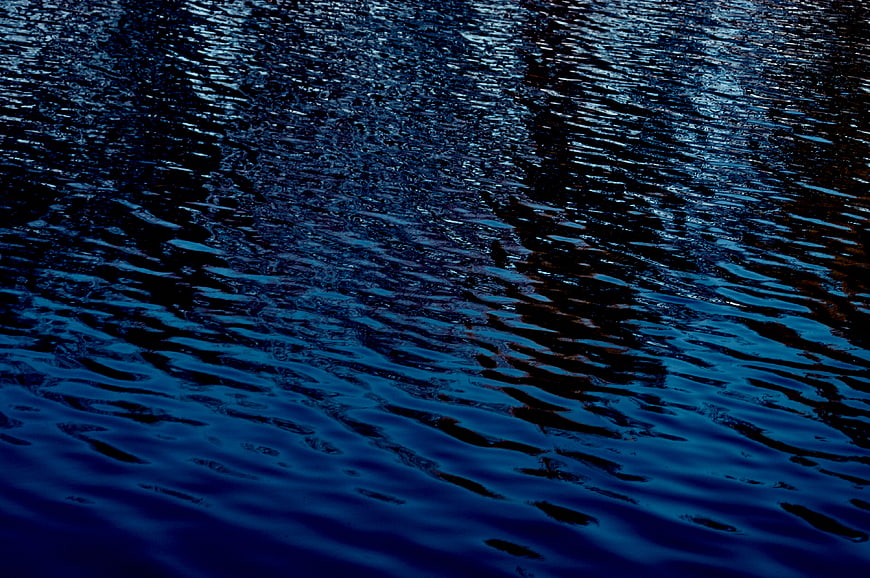Dark Blue Rippled Water Surface Texture