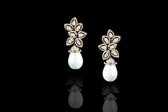 Luxury Diamond and Pearl Drop Earrings on Black Background
