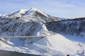 Snowy Mountain Highway Bridge in Siberia Winter Landscape