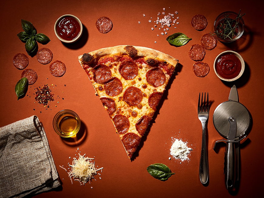Pepperoni Pizza Slice Flat Lay with Ingredients and Cutlery
