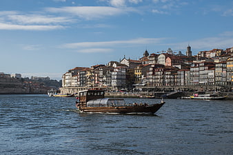 Traditional wooden boat on the Douro River in Porto, Portugal