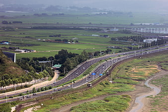 Aerial View of Highway Through Green Rural Landscape in Paju, Korea