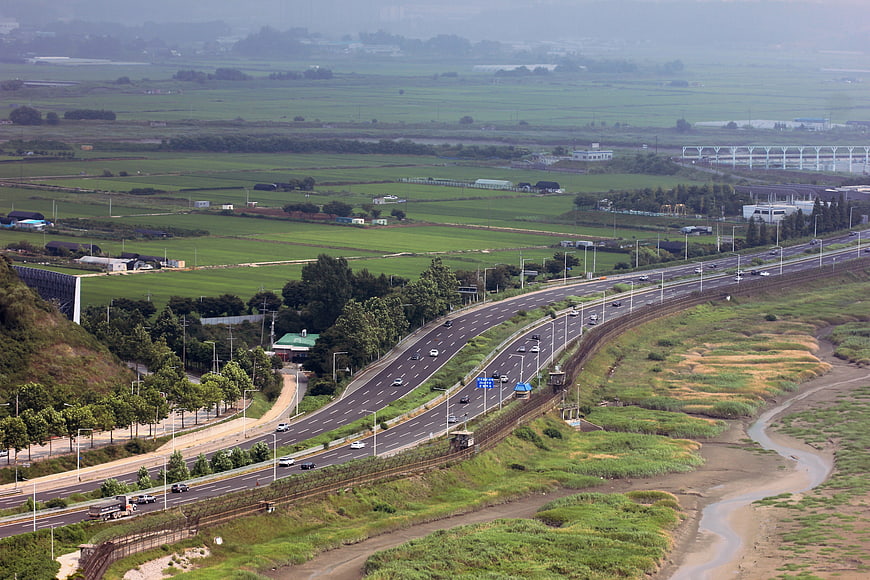 Aerial View of Highway Through Green Rural Landscape in Paju, Korea