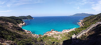 Panoramic View of Turquoise Bay with Wooden Staircase