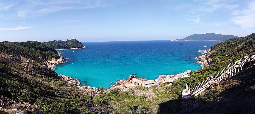 Panoramic View of Turquoise Bay with Wooden Staircase
