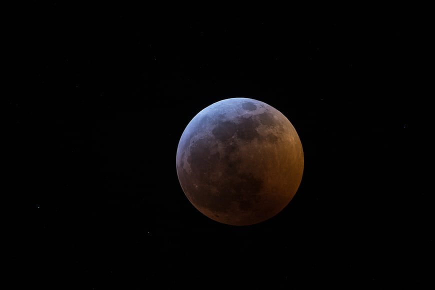 Blood Moon Lunar Eclipse in Night Sky