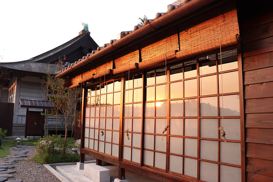 Traditional Japanese Architecture with Shoji Screens at Sunset