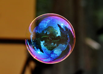 Colorful Soap Bubble with Inverted Nature Reflection