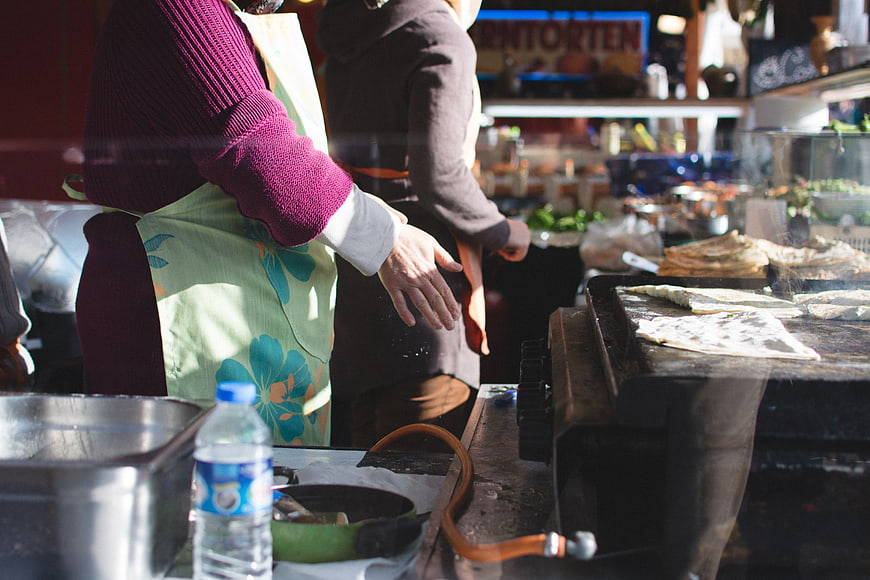 Woman cooking Turkish Gozleme at outdoor market