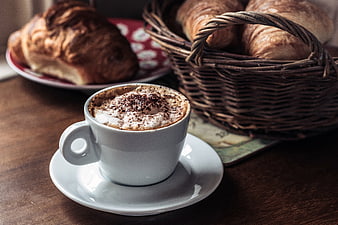 Cappuccino with Croissants in Wicker Basket