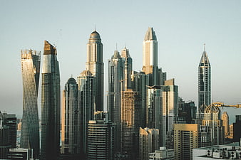 Dubai Marina skyline with modern skyscrapers at sunset