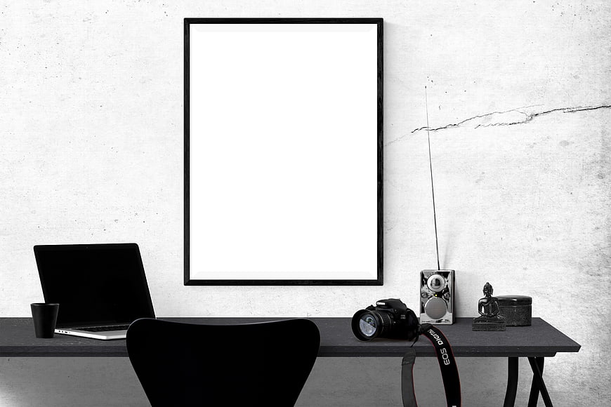 Minimalist Black and White Office Desk with Blank Poster Frame