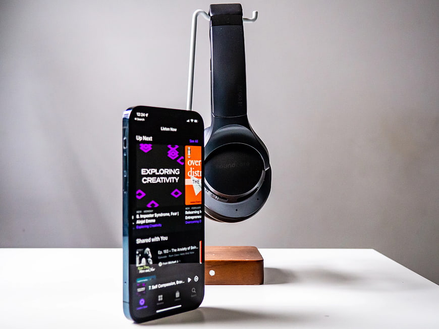 Smartphone and Headphones on Minimalist White Desk
