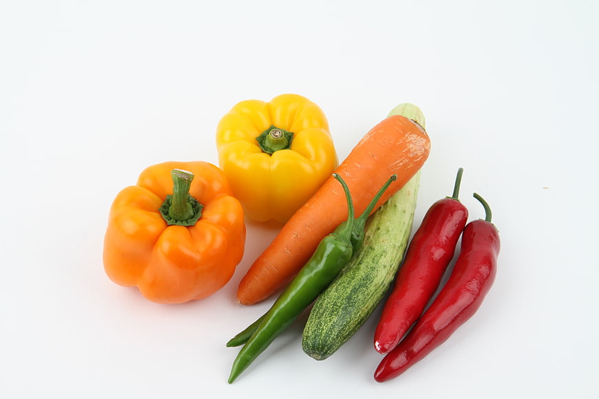 Fresh colorful vegetables on white background