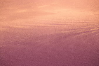 Abstract Pink and Orange Water Ripples Background