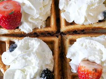 Close-up of Waffles with Whipped Cream and Fresh Berries