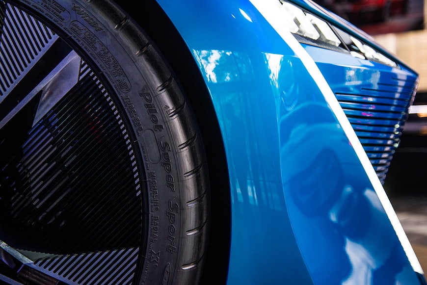 Close-up of blue concept car wheel and body