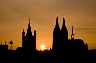 Cologne Cathedral Silhouette Against Golden Sunset Sky