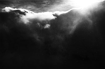 Dramatic Black and White Clouds with Sunbeams