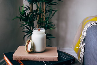 Cozy Home Decor with Candle and Books