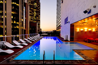 Rooftop swimming pool at sunset in downtown Los Angeles